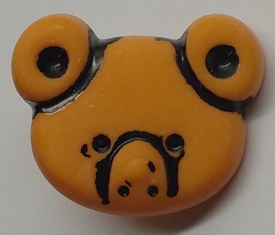 Ansikte av nallebjörn Orange 1,5 cm x 1,5 cm